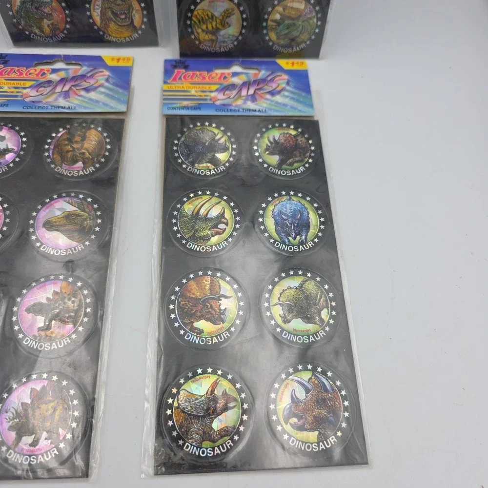 Jurassic Pogs On‎ Sheet Lot Of 32 Dinosaurs Laser Caps USA VTG NEW